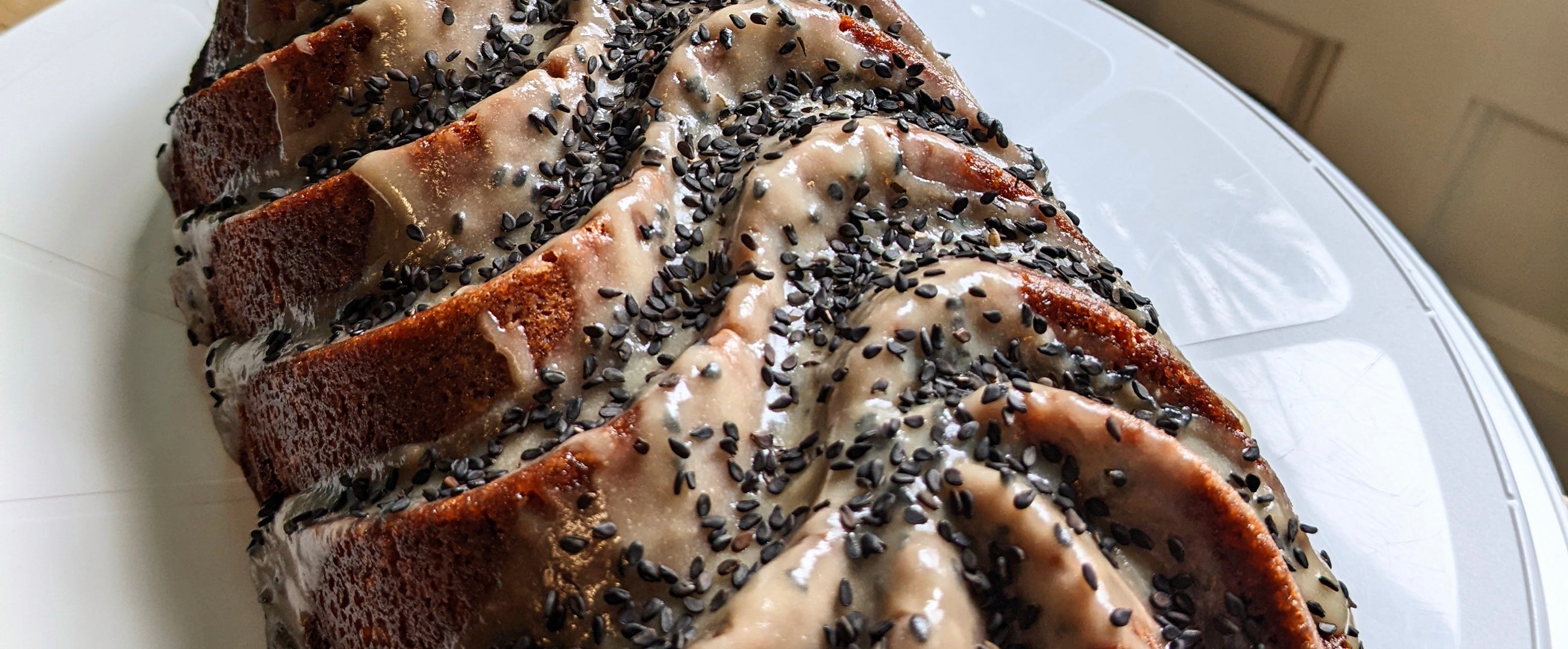 Orange Sesame Cake w/ Orange Tahini Icing & Toasted Black Sesame Seeds